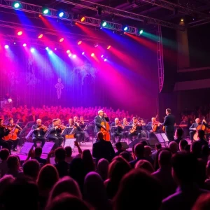 Concert audience enjoying a Broadway performance with an orchestra.