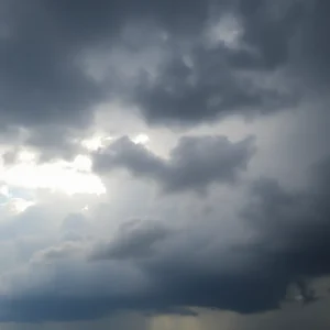 Dramatic sky over Central Florida with dark storm clouds indicating summer storms.
