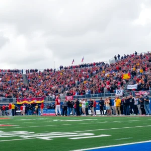 UCF football team in action with fans cheering
